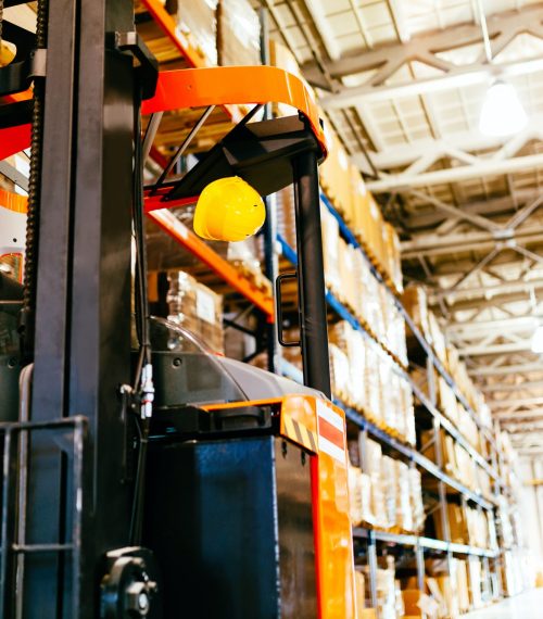Picture of forklift machine parked in warehouse